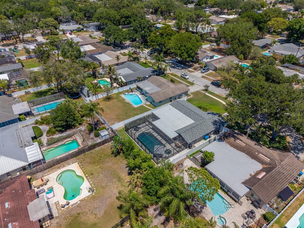 9628 122nd Way Seminole, FL 33772 - Photo 44 of 53 an aerial view of a house with a yard