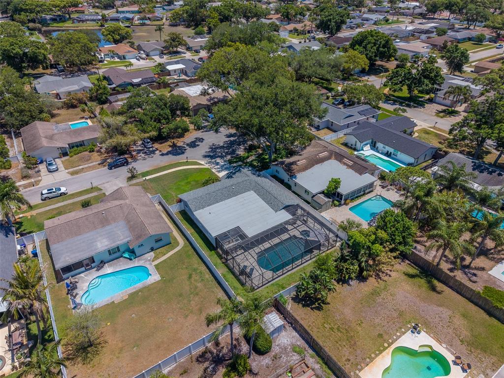 9628 122nd Way Seminole, FL 33772 - Photo 46 of 53 an aerial view of a house with a swimming pool