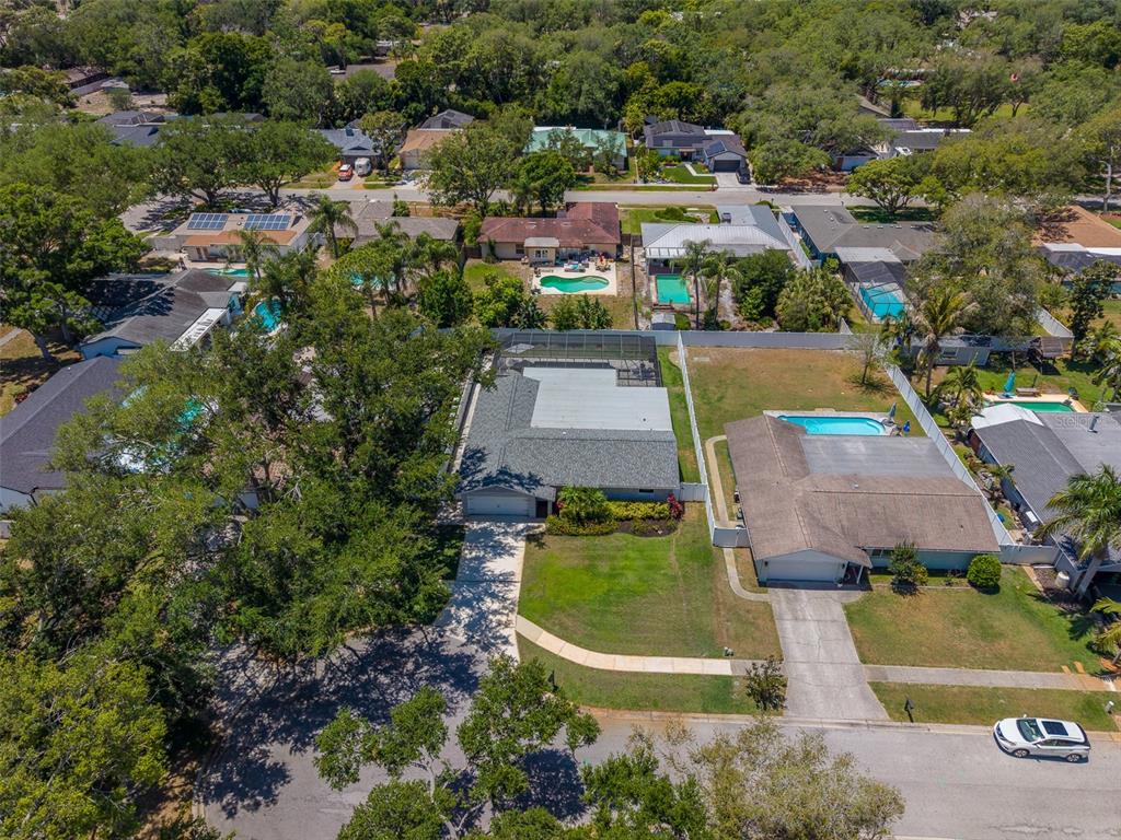 9628 122nd Way Seminole, FL 33772 - Photo 49 of 53 an aerial view of a house with a swimming pool