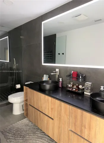 a bathroom with a sink and a toilet