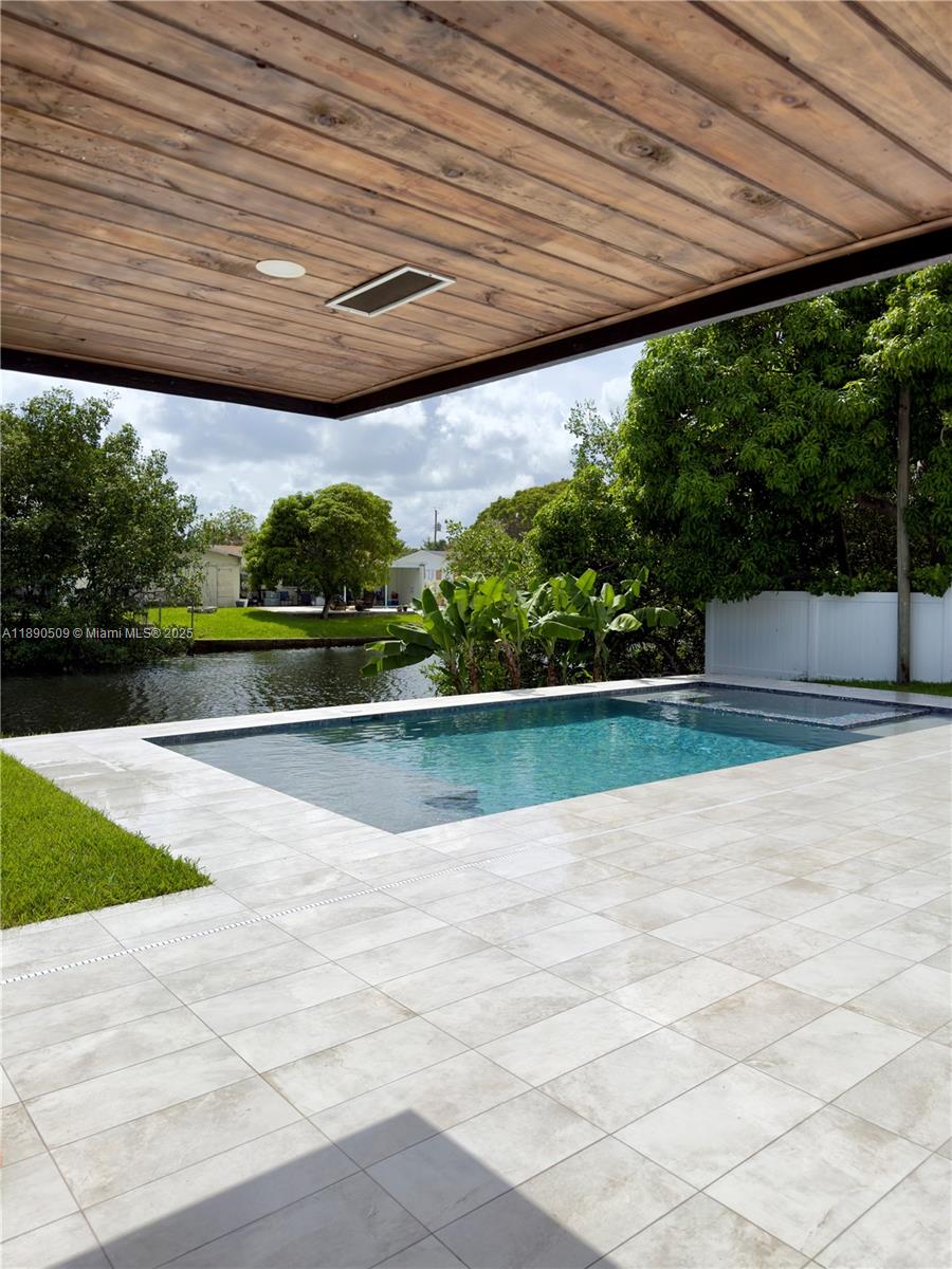 2350 Northeast 194th Street Miami, FL 33180 - Photo 24 of 24 a view of a backyard