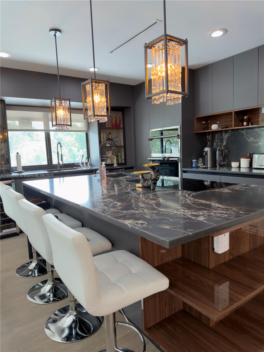 2350 Northeast 194th Street Miami, FL 33180 - Photo 6 of 24 a lobby with furniture and window