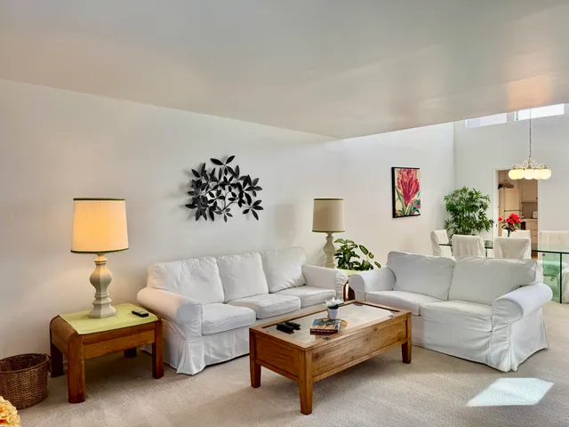 a living room with furniture and a couch