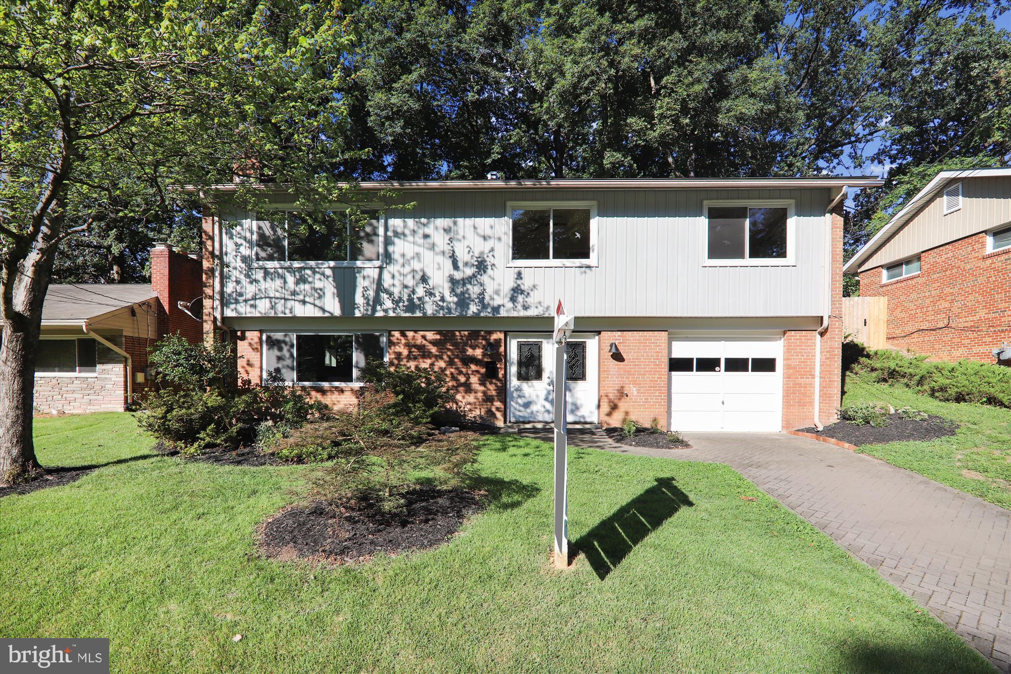 10708 Lombardy Road Silver Spring, MD 20901 - Photo 2 of 95 Graceful trees & shrubs in the front yard