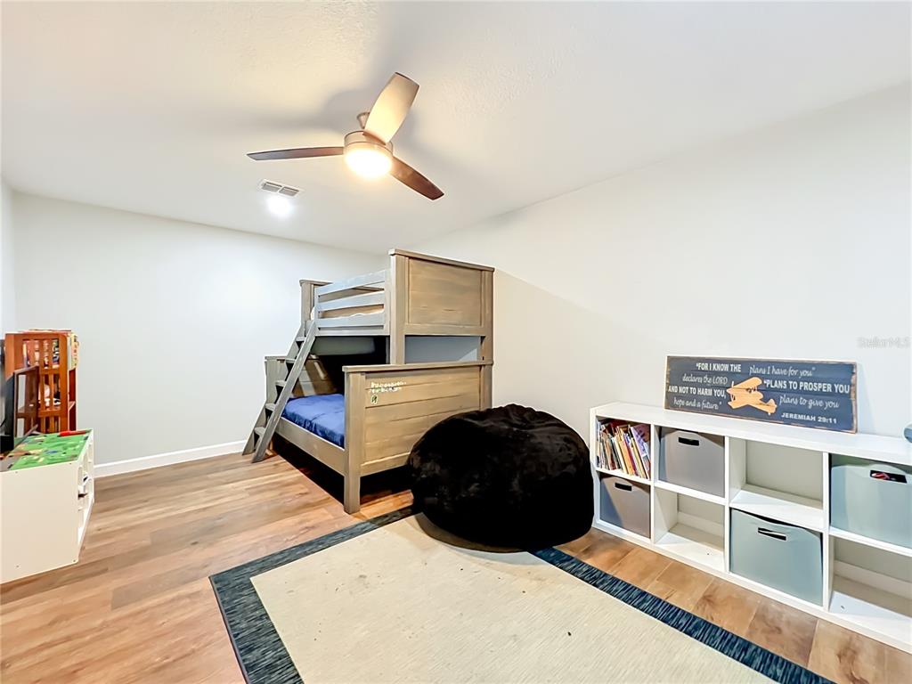 153 Variety Tree Circle Altamonte Springs, FL 32714 - Photo 29 of 44 a living room with furniture and a wooden floor