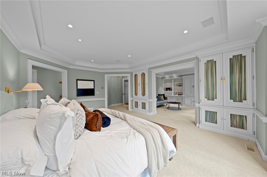 31900 Pinetree Road Pepper Pike, OH 44124 - Photo 21 of 43 The owners' bedroom enjoys built-ins and a designated sitting area.