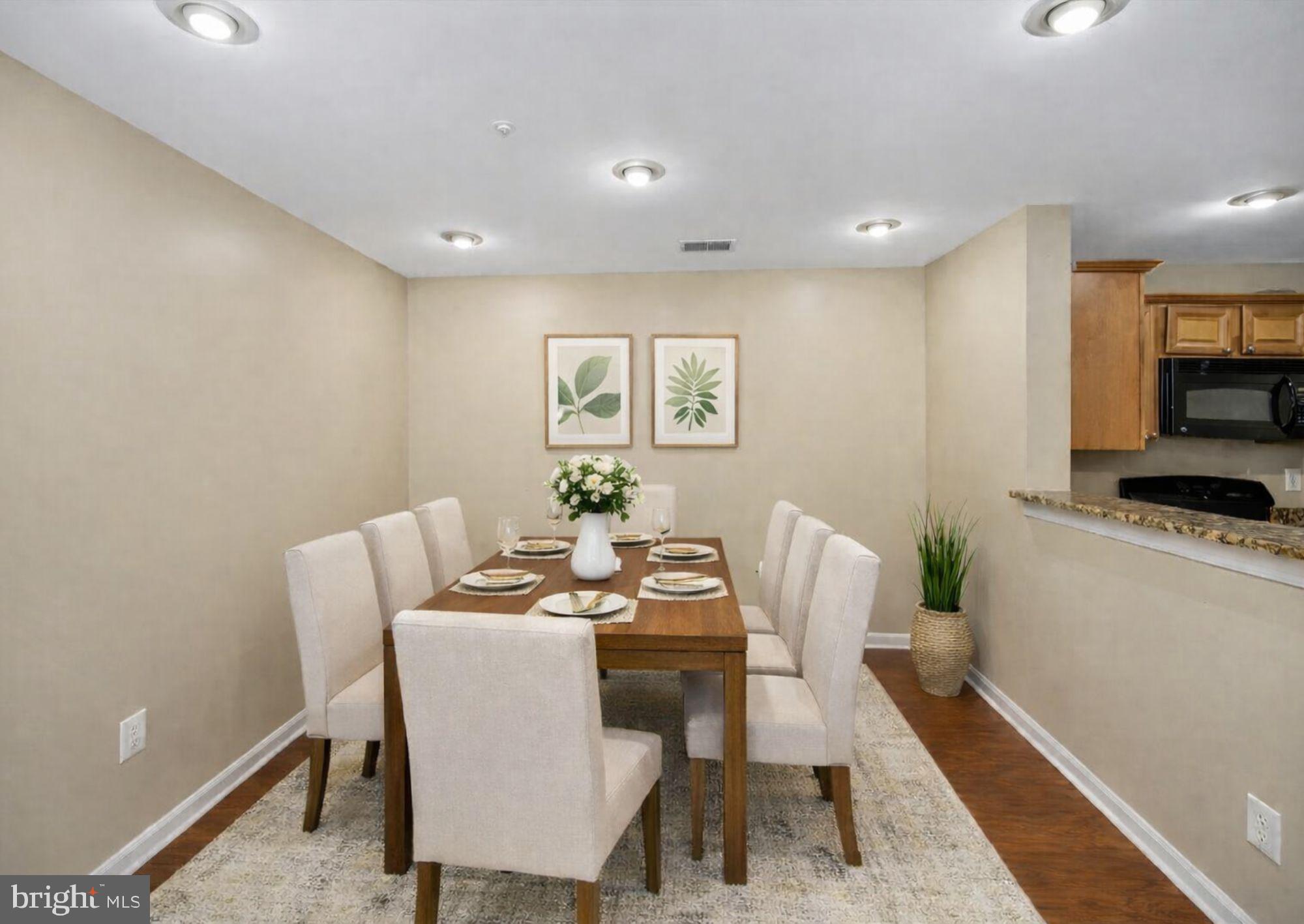 1067 Gardenview Loop, Unit 302 Woodbridge, VA 22191 - Photo 23 of 36 Virtually Staged Dining Room