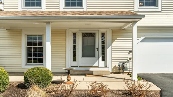 a view of a house with a lounge chair