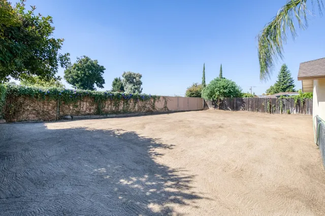 a view of lake with a building in the background