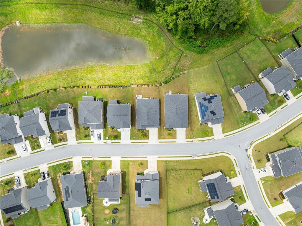 63 Conroe Court Hoschton, GA 30548 - Photo 34 of 44 a view of an swimming pool