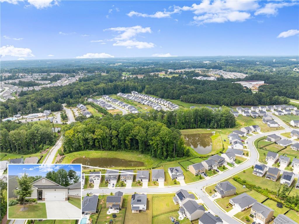 63 Conroe Court Hoschton, GA 30548 - Photo 37 of 44 a view of a city