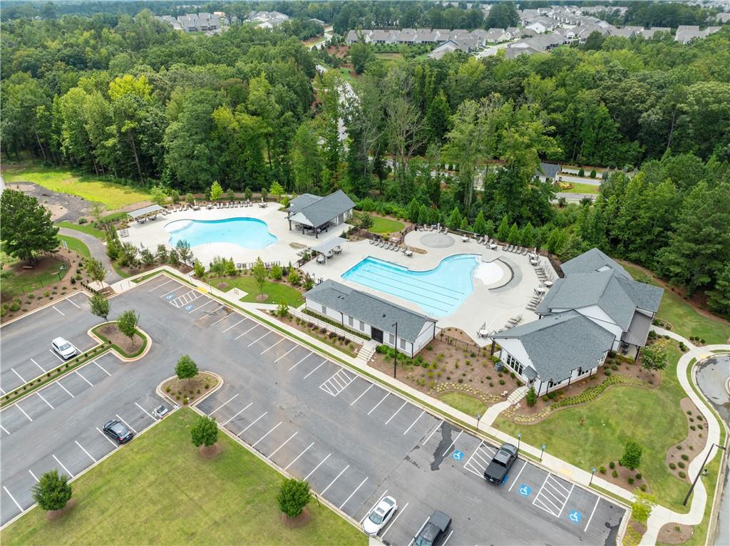 63 Conroe Court Hoschton, GA 30548 - Photo 43 of 44 an aerial view of a house with yard swimming pool and outdoor seating