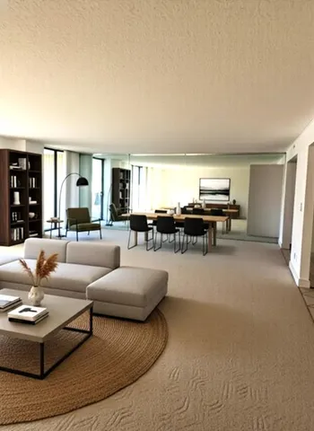 a living room with furniture and a piano
