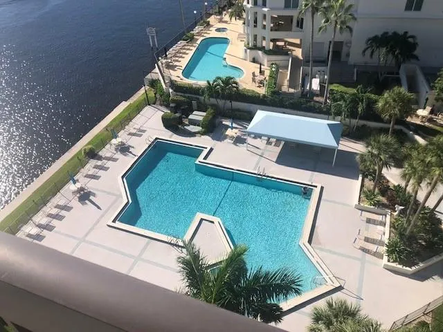 an aerial view of a house with outdoor space