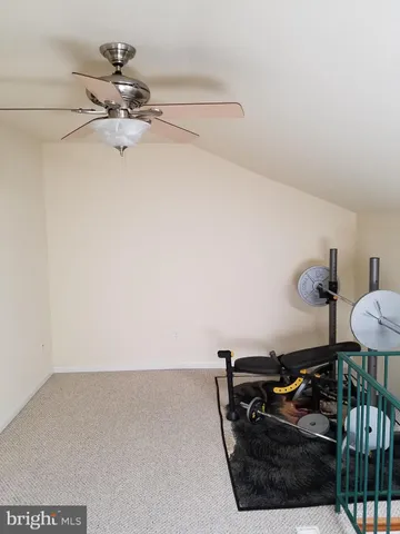 a kitchen with a stove a sink and a microwave