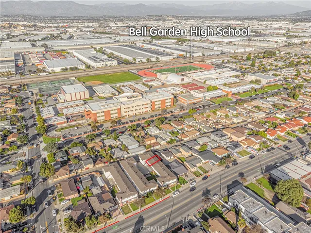 an aerial view of residential building with parking space