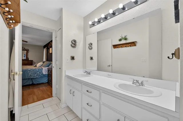 an aerial view of a house with a swimming pool yard and outdoor seating