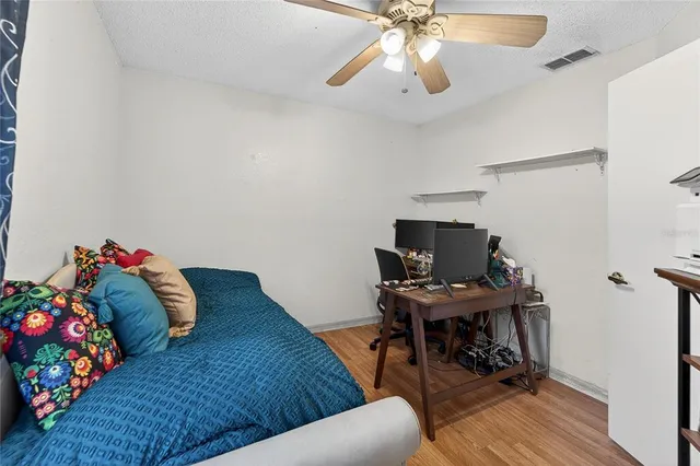 an aerial view of a house with a garden