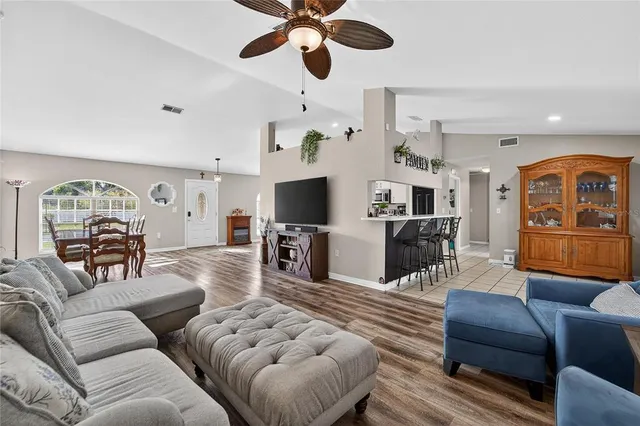 a kitchen with cabinets and stainless steel appliances