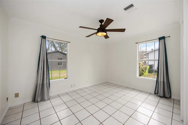 a view of an empty room and window