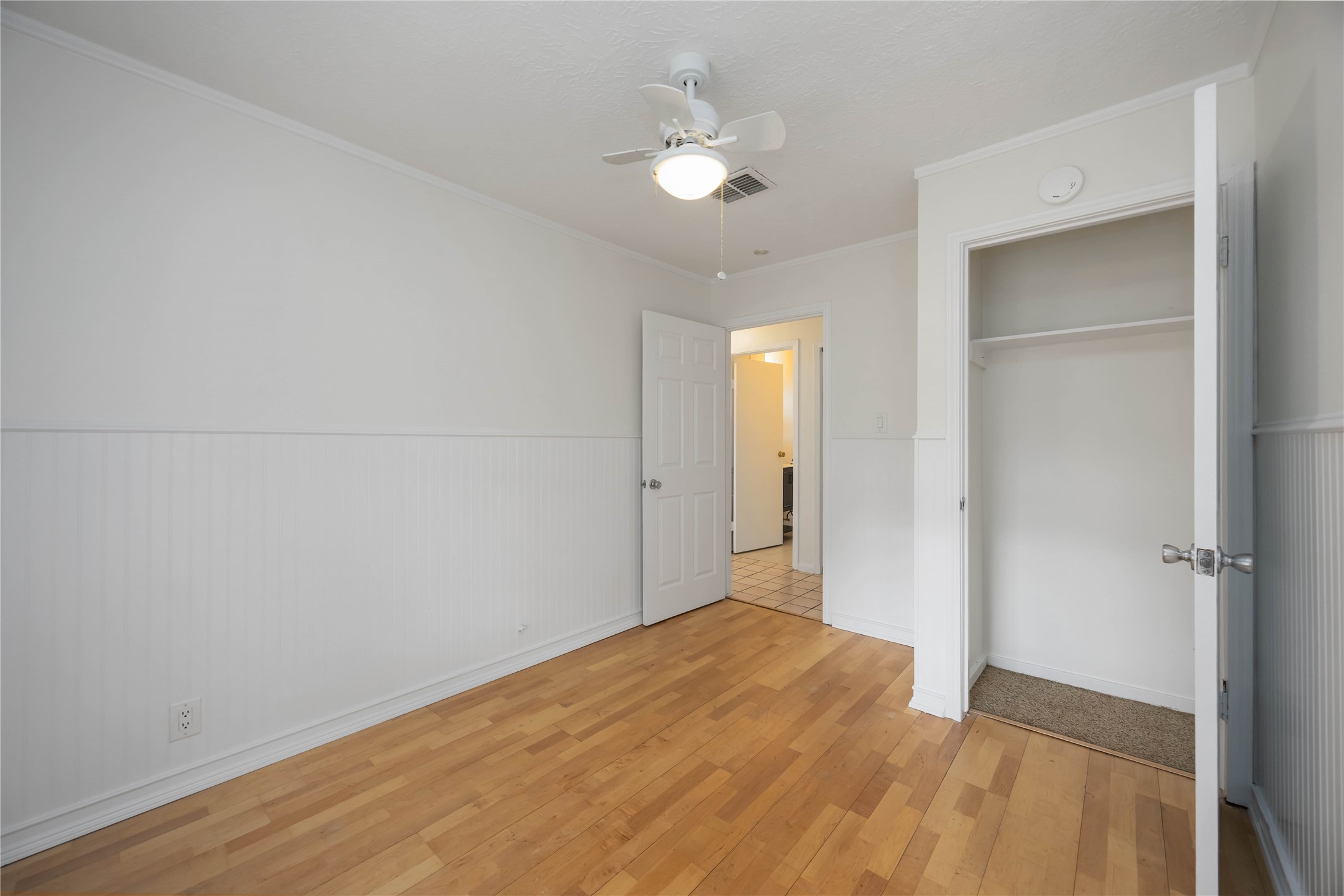 1721 Jones Street Rosenberg, TX 77471 - Photo 23 of 27 wooden floor in an empty room