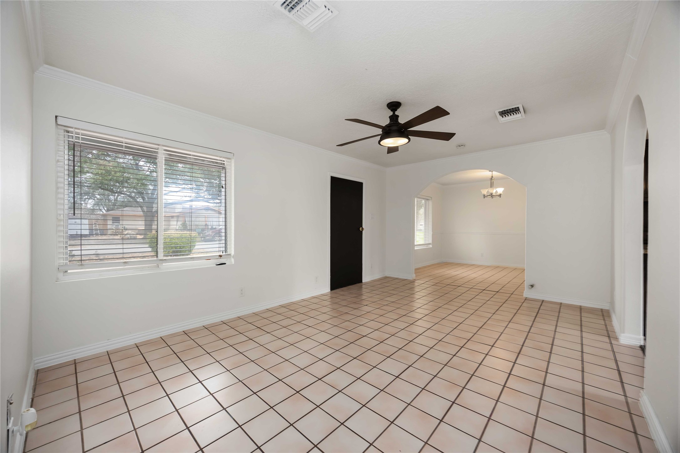 1721 Jones Street Rosenberg, TX 77471 - Photo 5 of 27 a view of an empty room and window