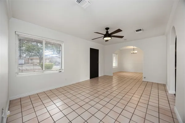 a view of an empty room and window