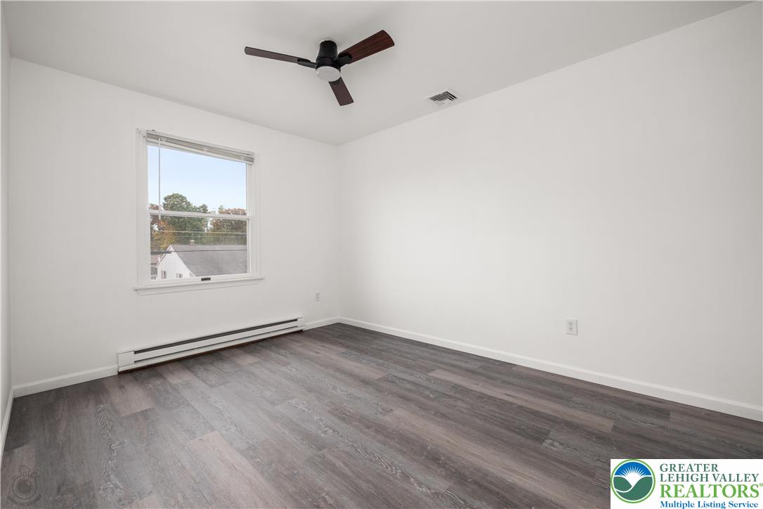 2735 Fairview Street Bethlehem, PA 18020 - Photo 24 of 43 an empty room with wooden floor and windows