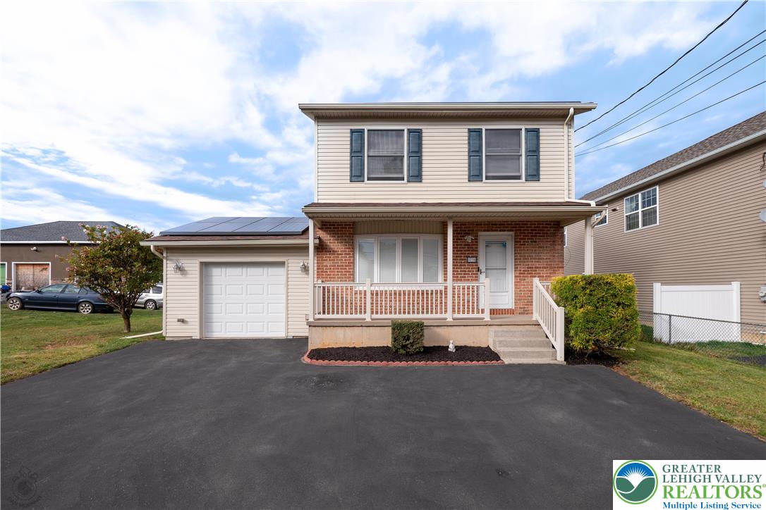 2735 Fairview Street Bethlehem, PA 18020 - Photo 43 of 43 a front view of a house with a yard and garage