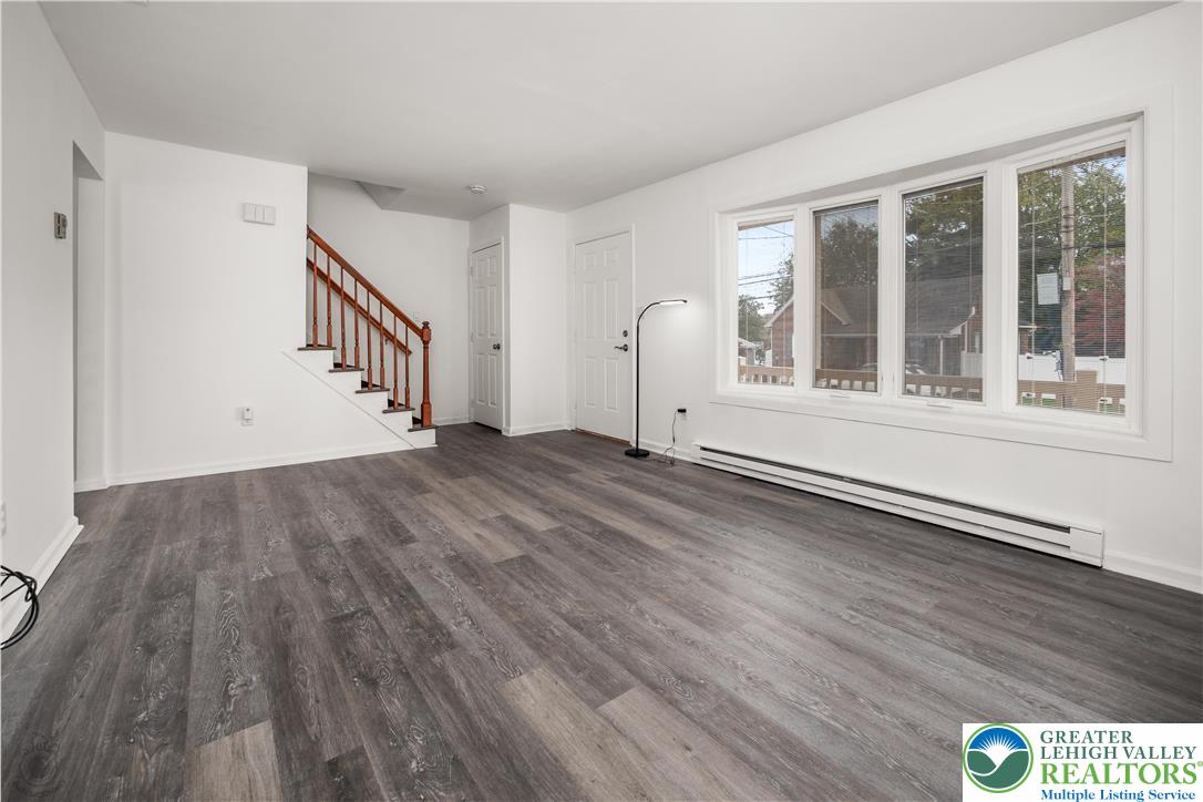 2735 Fairview Street Bethlehem, PA 18020 - Photo 8 of 43 a view of an empty room with wooden floor and a window