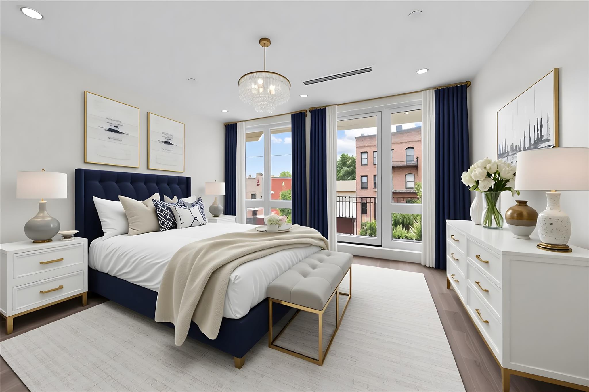 312 Fenimore Street Brooklyn, NY 11225 - Photo 4 of 37 Bedroom with wood finished floors, multiple windows, access to exterior, a chandelier, and recessed lighting