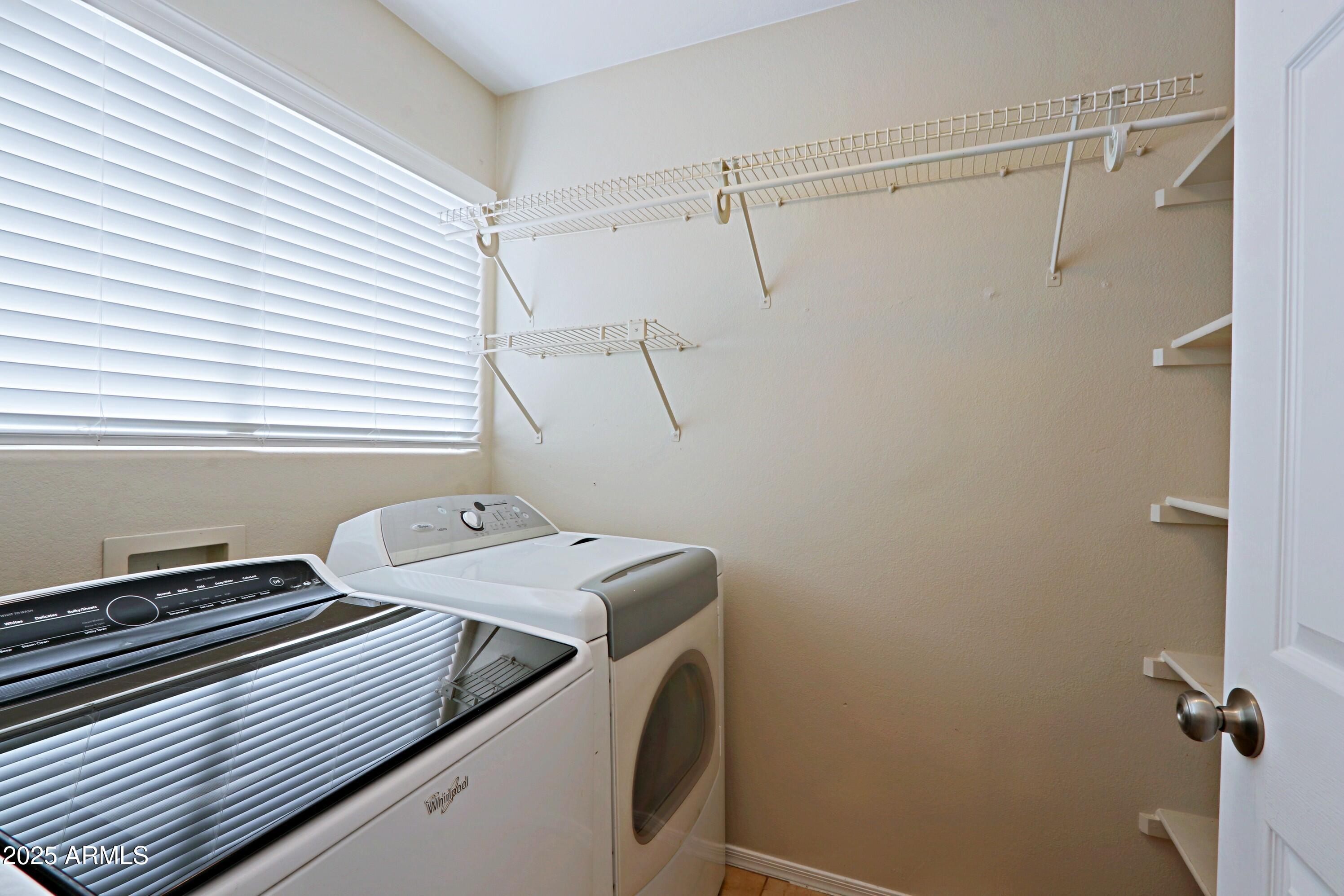 4047 East Rowel Road Phoenix, AZ 85050 - Photo 8 of 33 a utility room with dryer and washer
