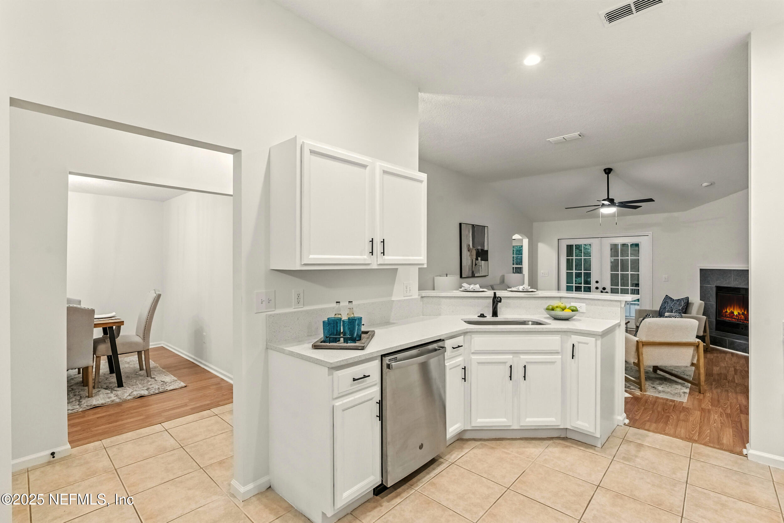 4385 Comanche Trail Boulevard St. Johns, FL 32259 - Photo 11 of 33 a kitchen with a sink and cabinets