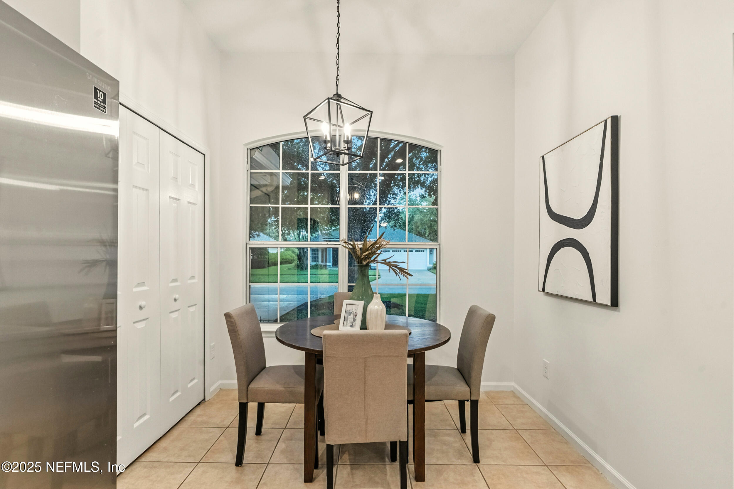 4385 Comanche Trail Boulevard St. Johns, FL 32259 - Photo 14 of 33 a view of a dining room with furniture window and outside view