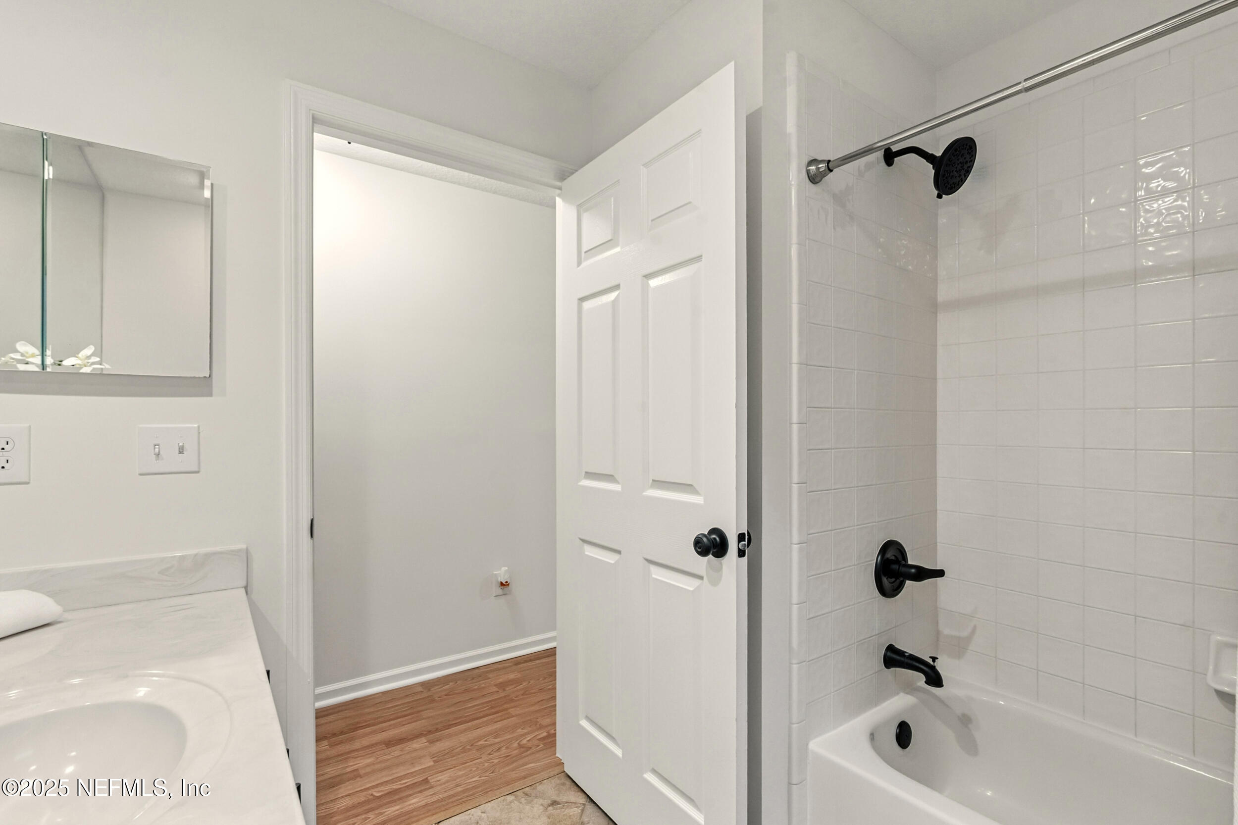 4385 Comanche Trail Boulevard St. Johns, FL 32259 - Photo 24 of 33 a bathroom with a bathtub and a shower