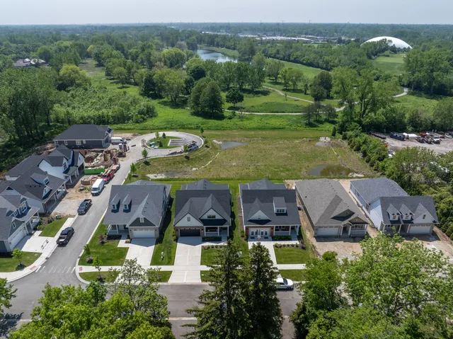 an aerial view of a house with a garden