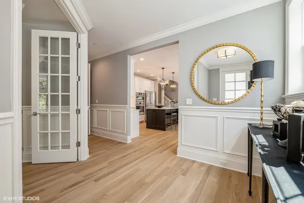 a view of a living room and wooden floor
