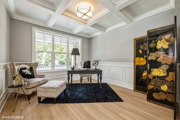 a living room with a couch and a window