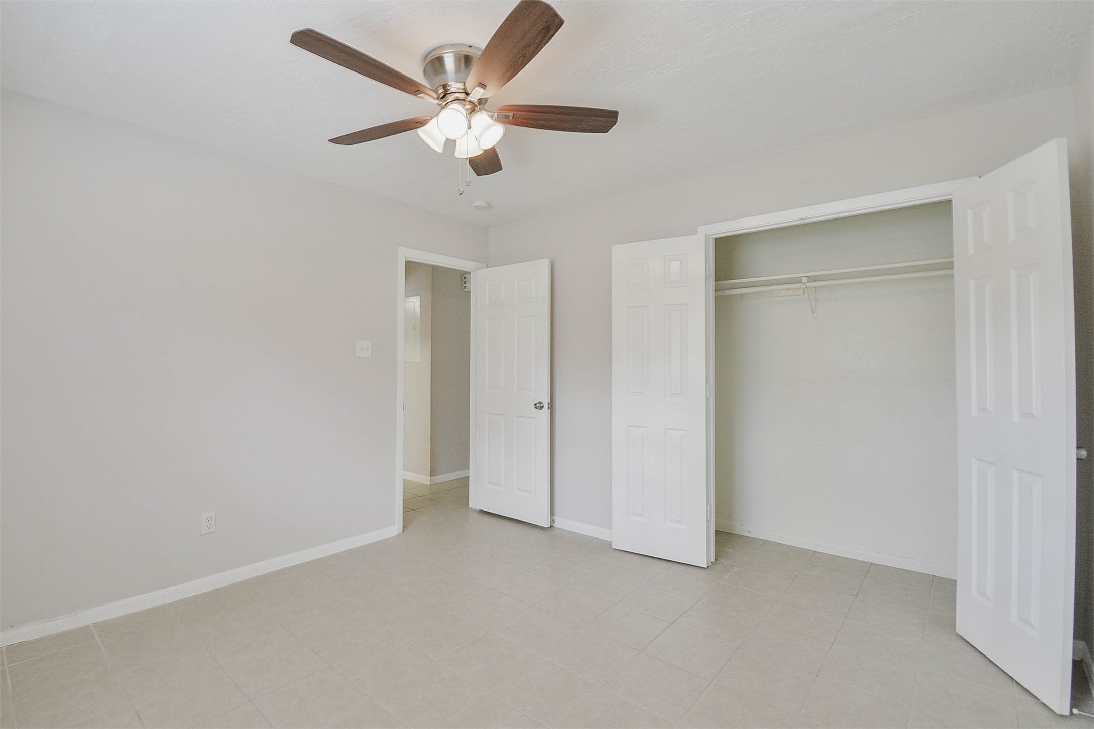 3 Magnolia Lane, Unit 1 Huffman, TX 77336 - Photo 15 of 23 an empty room with closet and fan