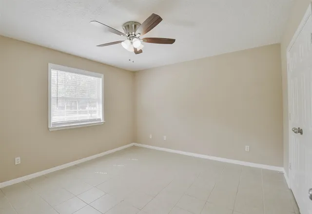 en empty room with windows