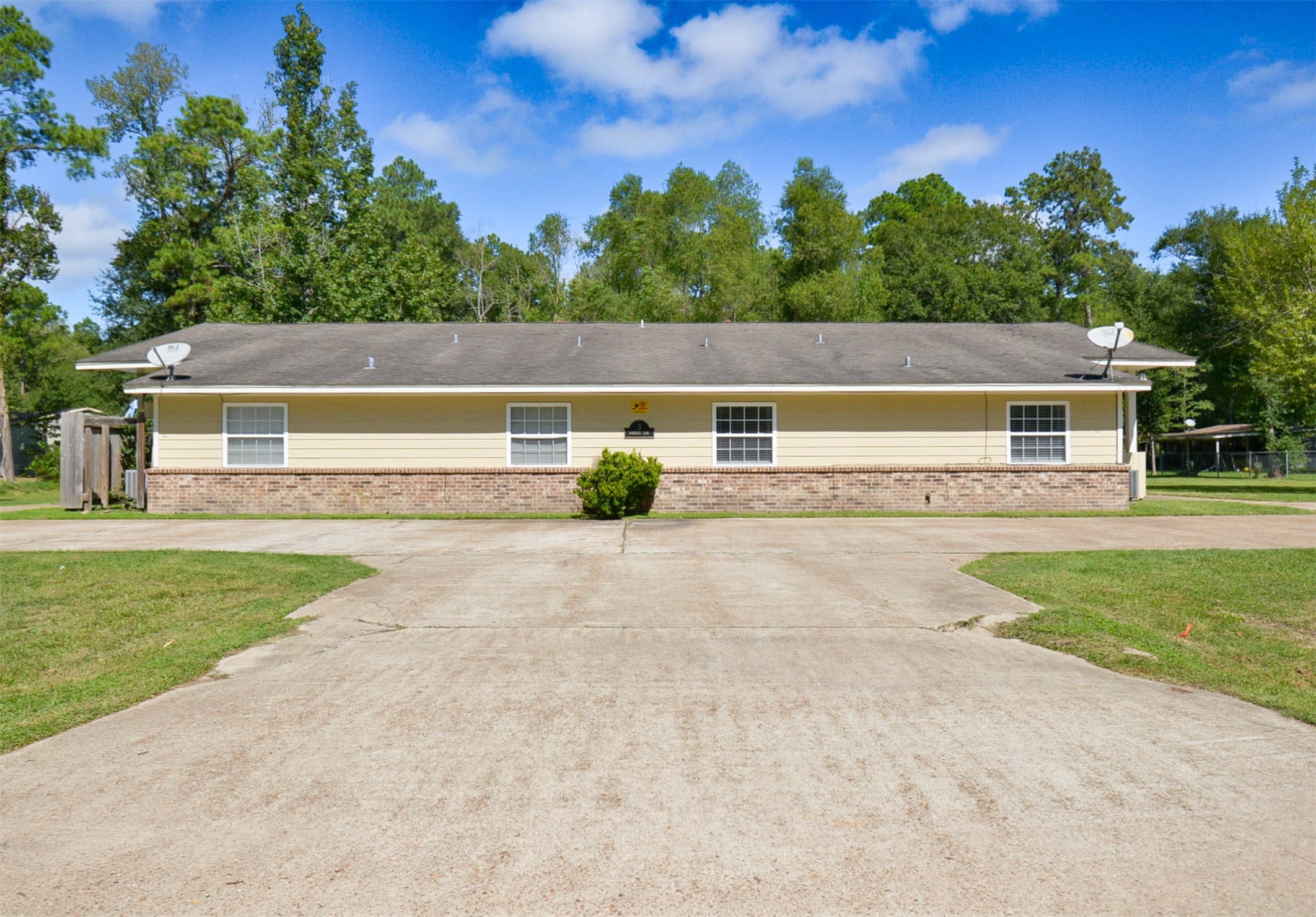 3 Magnolia Lane, Unit 1 Huffman, TX 77336 - Photo 22 of 23 a view of house with outdoor space
