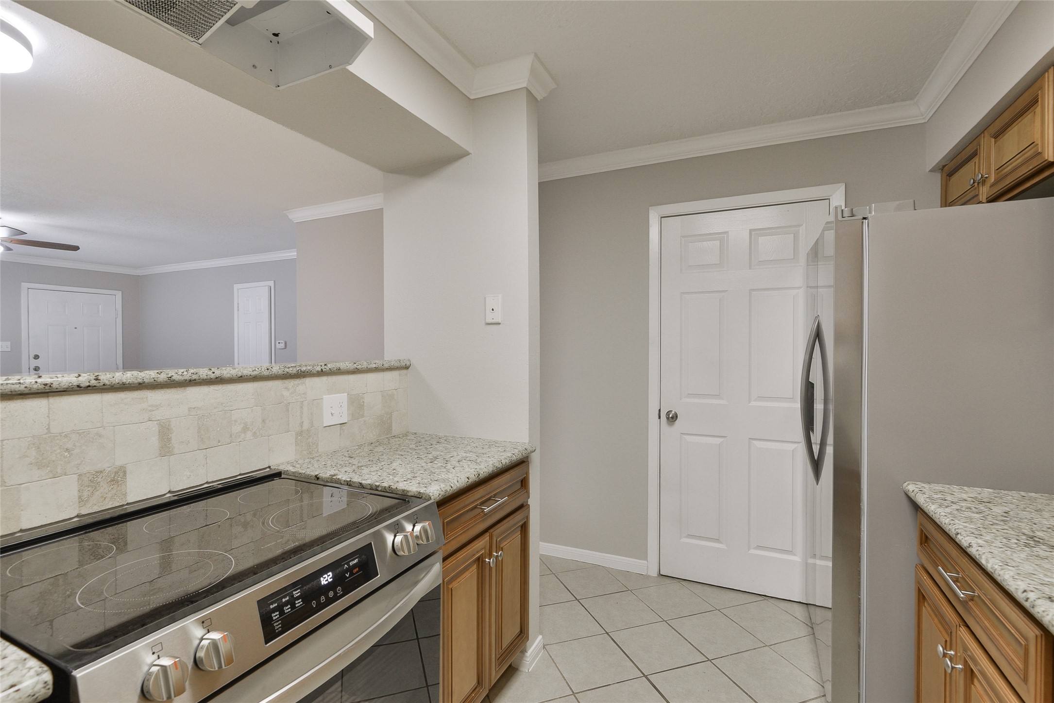 3 Magnolia Lane, Unit 1 Huffman, TX 77336 - Photo 10 of 23 a view of a kitchen counter space and stove top oven