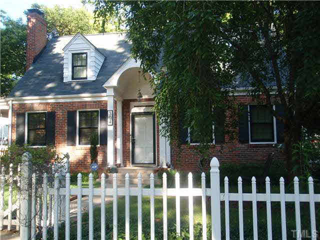 304 Brooks Avenue Raleigh, NC 27607 - Photo 1 of 14 Welcoming fenced and landscaped front yard. Exterior Front