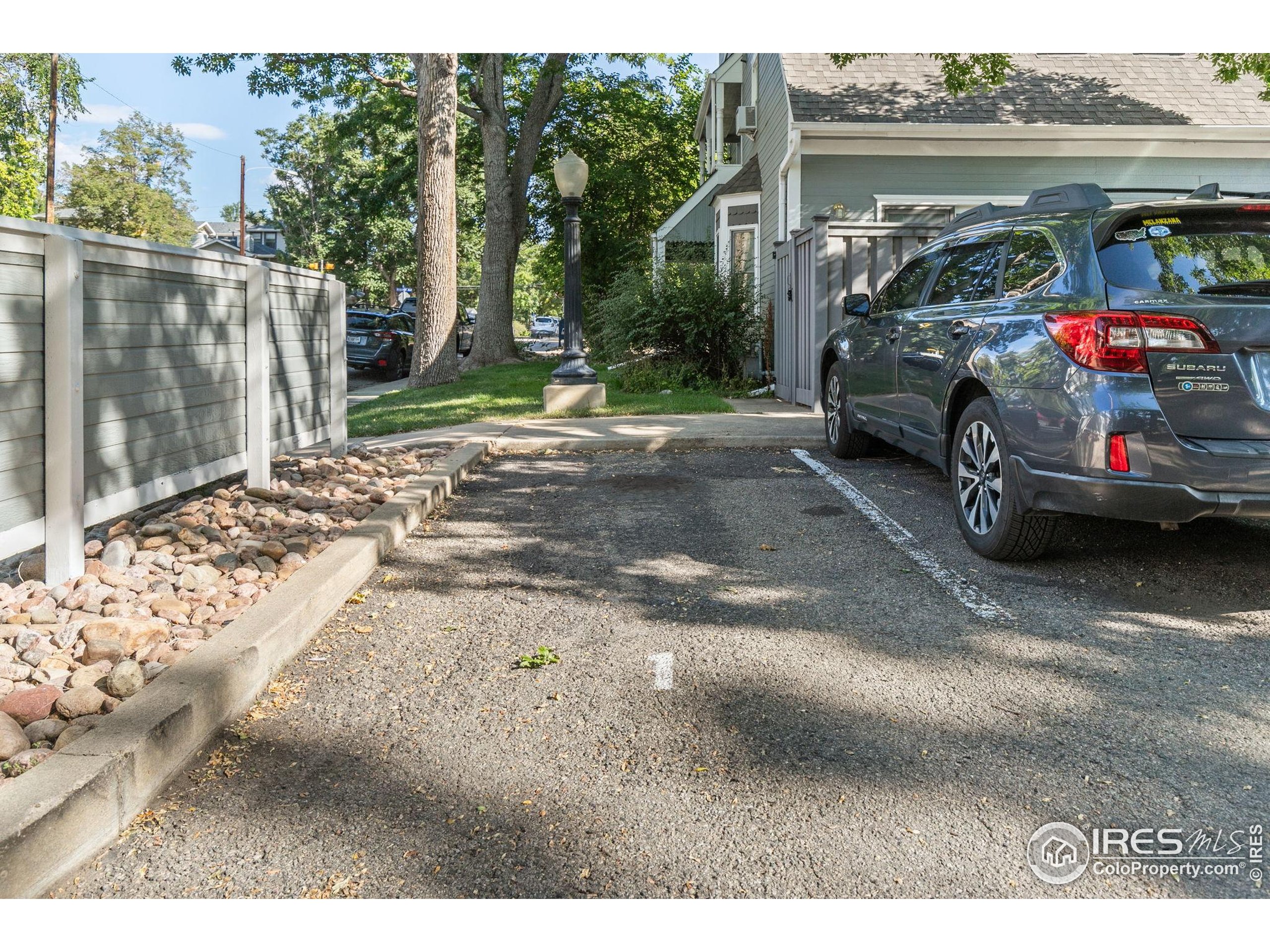 1430 18th Street, Unit 1 Boulder, CO 80302 - Photo 28 of 29 a view of garage with a car parked in it