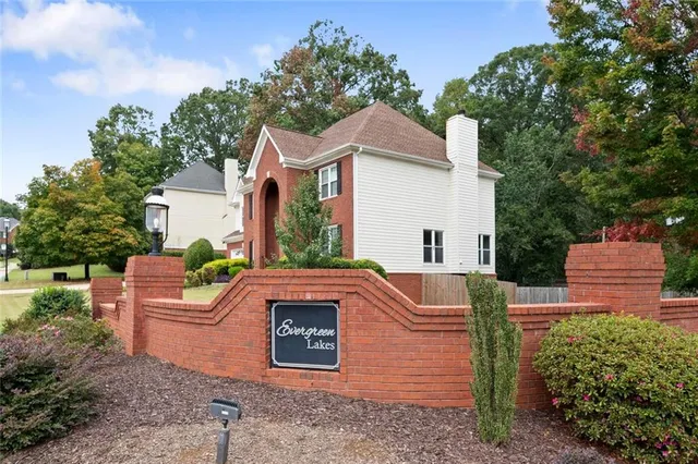 a view of a house with a garden