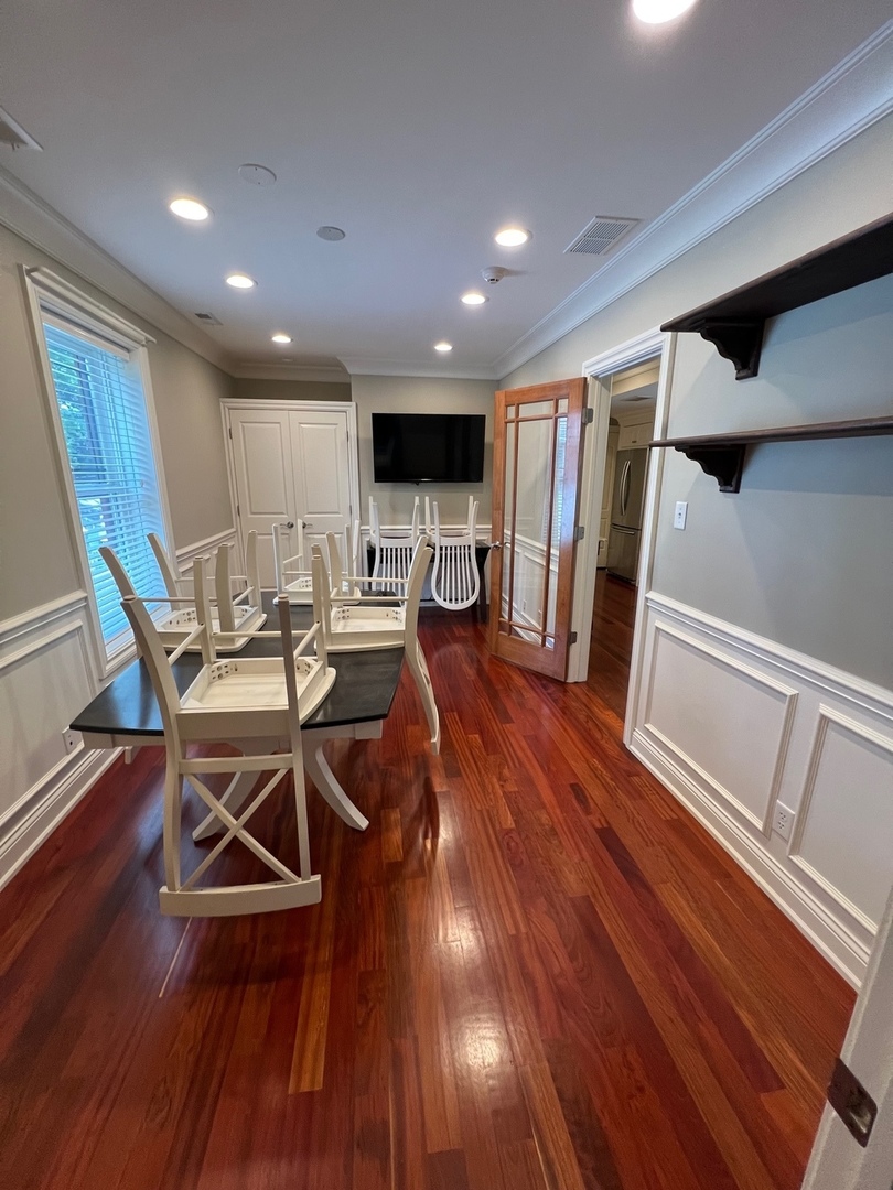 1000 Ridge Road, Unit 2 Wilmette, IL 60091 - Photo 7 of 10 a living room with furniture and a wooden floor