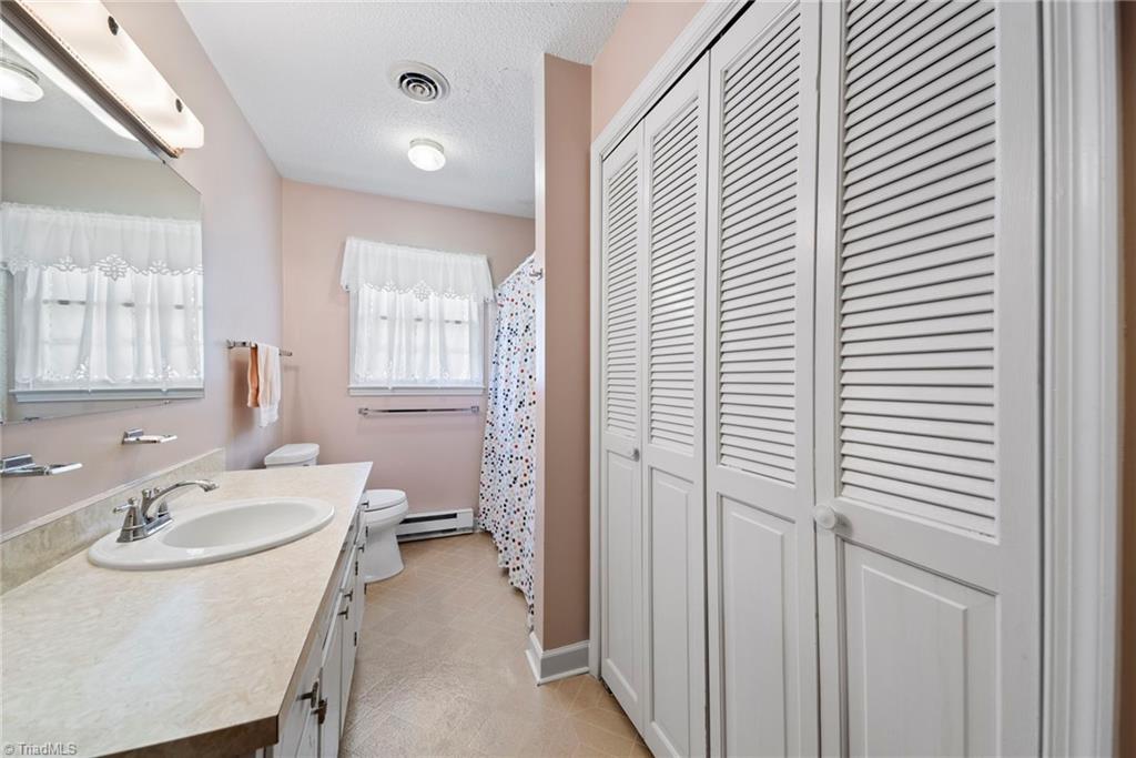5219 Millstone Road Oak Ridge, NC 27310 - Photo 36 of 37 Closet in second full bath