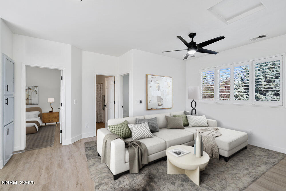 1179 Tule Drive Reno, NV 89521 - Photo 28 of 48 a living room with furniture and a large window
