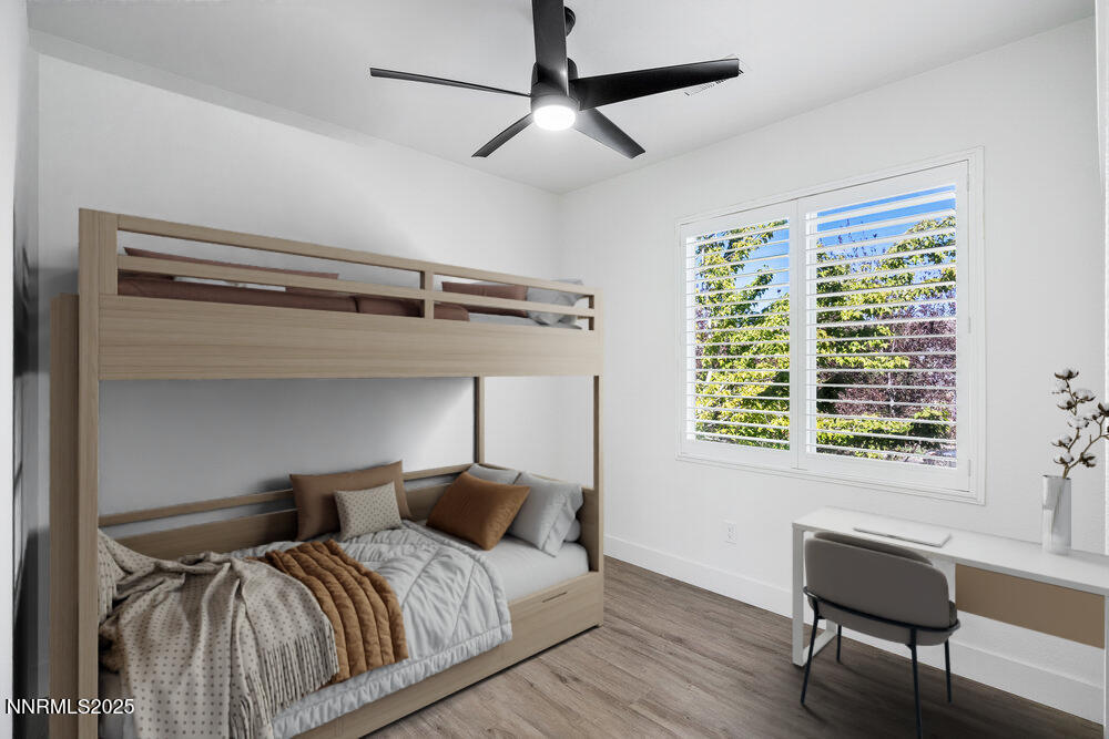 1179 Tule Drive Reno, NV 89521 - Photo 39 of 48 a bedroom with a bed and a window