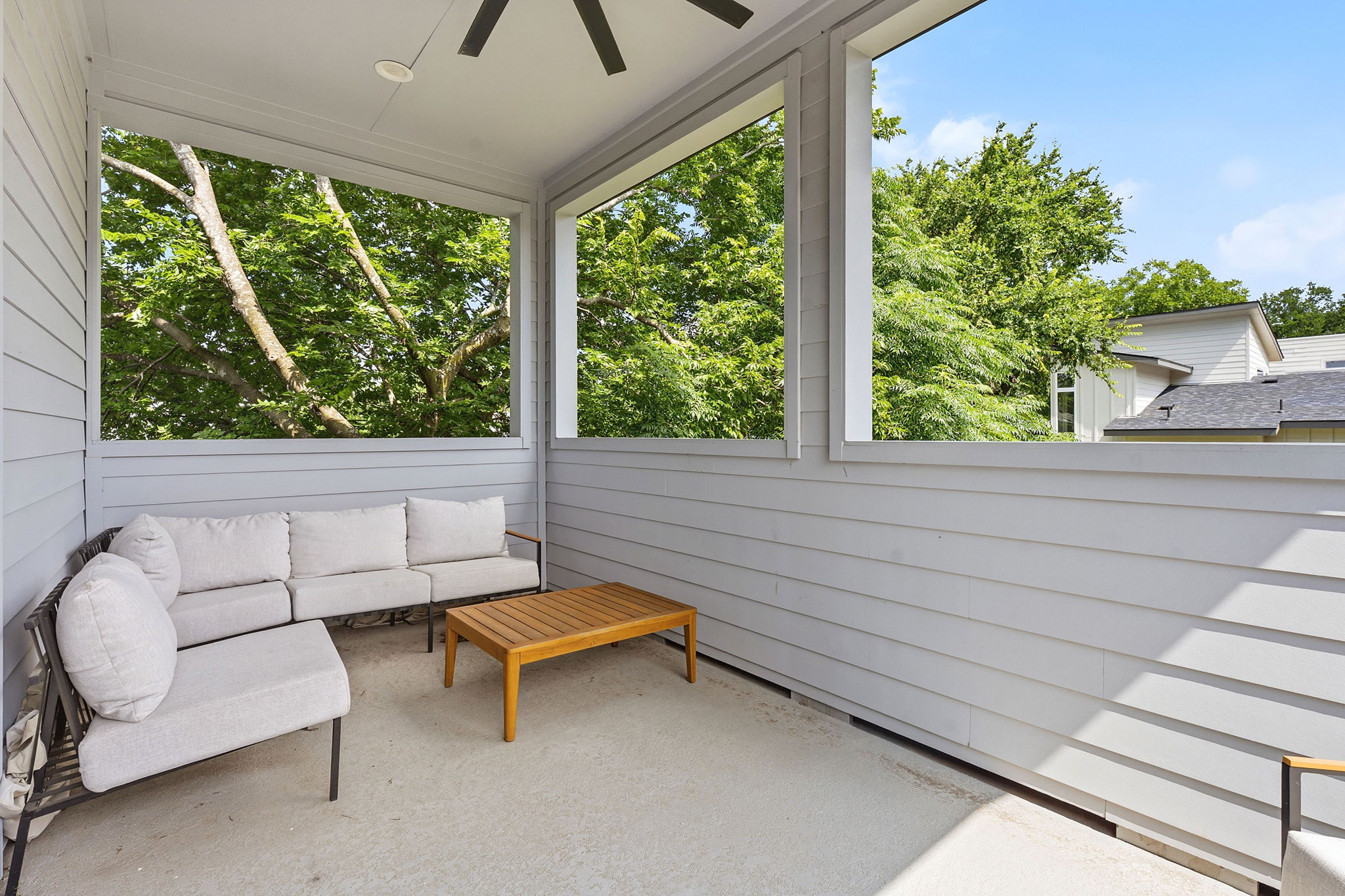1707 Deloney Street, Unit 2 Austin, TX 78721 - Photo 24 of 26 An inviting covered patio offers a private outdoor retreat with scenic views.